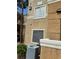 A modern building with visible air conditioning unit, stucco facade and well-maintained exterior at 8070 W Russell Rd # 1028, Las Vegas, NV 89113