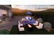 Outdoor living space with pool, fire pit, and grill area at 8721 Robinson Ridge Dr, Las Vegas, NV 89117
