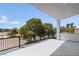 Relax on the balcony with stunning views of the golf course and mature trees at 8721 Robinson Ridge Dr, Las Vegas, NV 89117
