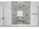 En Suite bathroom featuring a luxurious glass enclosed shower with dual shower heads and seating at 8721 Robinson Ridge Dr, Las Vegas, NV 89117