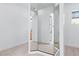 Bedroom featuring large mirror doors and views of the hallway, bedroom, and bathroom at 8721 Robinson Ridge Dr, Las Vegas, NV 89117