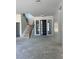 Contemporary style foyer featuring a modern front door with sidelights and an elegant staircase at 8721 Robinson Ridge Dr, Las Vegas, NV 89117