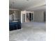 Open kitchen with an island featuring a blue marbled countertop and pendant lighting at 8721 Robinson Ridge Dr, Las Vegas, NV 89117