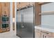 Kitchen featuring stainless steel appliances, wood cabinets, and white countertops at 8721 Robinson Ridge Dr, Las Vegas, NV 89117