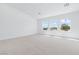 Bright and spacious living area with recessed lighting and expansive windows for natural light at 8721 Robinson Ridge Dr, Las Vegas, NV 89117