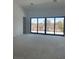 Open living room design boasting a wall of windows with beautiful scenic views at 8721 Robinson Ridge Dr, Las Vegas, NV 89117