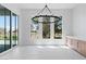 Bright living room features large windows and a convenient wet bar at 8721 Robinson Ridge Dr, Las Vegas, NV 89117