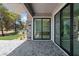 Covered patio with stone flooring and outdoor kitchen, perfect for entertaining at 8721 Robinson Ridge Dr, Las Vegas, NV 89117