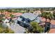 Two-story home featuring stone accents, a three-car garage, and an expansive golf course view at 8721 Robinson Ridge Dr, Las Vegas, NV 89117