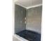This primary bathroom features a large shower stall ready for tile and fixtures at 8721 Robinson Ridge Dr, Las Vegas, NV 89117