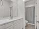 Clean, bright bathroom with modern fixtures and a large vanity at 8870 Sasquatch Run Ave, Las Vegas, NV 89166