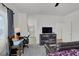 Comfortable bedroom including a workspace and sitting area with contemporary decor at 8870 Sasquatch Run Ave, Las Vegas, NV 89166
