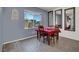 Cozy dining room with a view of the backyard and modern decor at 8870 Sasquatch Run Ave, Las Vegas, NV 89166