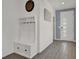 Entryway featuring a built-in storage bench and a view of the front door at 8870 Sasquatch Run Ave, Las Vegas, NV 89166