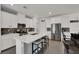 Beautiful kitchen that is spacious with an island, white countertops, and stainless steel appliances at 8870 Sasquatch Run Ave, Las Vegas, NV 89166