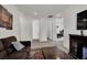 Cozy upstairs living room includes a fireplace and comfortable seating at 8870 Sasquatch Run Ave, Las Vegas, NV 89166