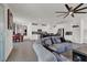 Bright open-concept living area seamlessly connected to a modern kitchen and dining space at 8870 Sasquatch Run Ave, Las Vegas, NV 89166