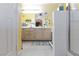 Bright bathroom featuring double sinks, a fan, and a white shower at 915 Graceful Moon Ave, Henderson, NV 89015