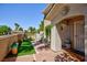 Welcoming front porch with well manicured lawn and garden at 915 Graceful Moon Ave, Henderson, NV 89015