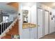 Stylish interior featuring staircase and convenient wet bar area at 915 Graceful Moon Ave, Henderson, NV 89015