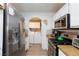 Efficient kitchen with stainless steel appliances and modern cabinetry at 915 Graceful Moon Ave, Henderson, NV 89015