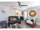 Inviting living room featuring neutral walls and contemporary ceiling fan at 915 Graceful Moon Ave, Henderson, NV 89015