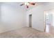 Carpeted bedroom with a sliding door closet and easy access to adjacent rooms at 925 Crescent Falls St, Henderson, NV 89011