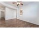Living room with tile floors, ceiling fan and lots of light at 925 Crescent Falls St, Henderson, NV 89011