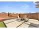 Inviting backyard area featuring modern pavers, desert landscaping and an outdoor fire pit at 9630 Tuscola Ct, Las Vegas, NV 89148
