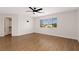 Light filled room with vinyl floors provides large windows and closet at 9630 Tuscola Ct, Las Vegas, NV 89148