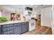 Open kitchen design with stainless appliances and bar seating at 976 El Camino Way, Boulder City, NV 89005