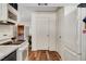 Clean kitchen showcasing new appliances and an open layout with connecting rooms at 976 El Camino Way, Boulder City, NV 89005