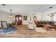 This expansive living area features hardwood flooring, a dining area, and comfortable seating for easy living at 976 El Camino Way, Boulder City, NV 89005