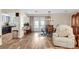 This living area showcases an open layout, seamlessly connecting a breakfast bar, dining room, and cozy seating at 976 El Camino Way, Boulder City, NV 89005