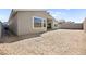 This backyard features dirt for landscaping and a block wall for privacy at 9815 Evergreen Pine St, Las Vegas, NV 89166