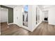 Inviting foyer with wood floors, ample natural light and modern design at 9815 Evergreen Pine St, Las Vegas, NV 89166