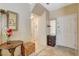 Cozy entryway featuring tile floors, neutral walls, and a white front door at 1007 Shades End Ave, North Las Vegas, NV 89081