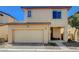 Inviting two-story home featuring a two-car garage and well-maintained landscaping at 1007 Shades End Ave, North Las Vegas, NV 89081