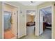 A bright hallway showcases doorways to a bathroom and bedrooms, enhancing accessibility at 1007 Shades End Ave, North Las Vegas, NV 89081