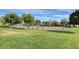 Scenic view of a community park with a playground, offering a great space for families at 1007 Shades End Ave, North Las Vegas, NV 89081