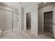 Bathroom featuring a glass enclosed shower and linen closet at 1047 Atkins Ln, Mesquite, NV 89027