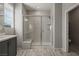 Bathroom featuring a glass-enclosed shower with a built in seat at 1047 Atkins Ln, Mesquite, NV 89027