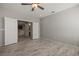Spacious bedroom showcasing double doors and modern luxury vinyl plank flooring at 1047 Atkins Ln, Mesquite, NV 89027