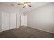 Spacious bedroom featuring neutral carpet and a large closet with access to hallway at 1047 Atkins Ln, Mesquite, NV 89027