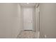 Entryway features wood-look flooring and a white front door, leading into the home at 1047 Atkins Ln, Mesquite, NV 89027