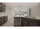 Open kitchen with stainless steel dishwasher, and bright natural light at 1047 Atkins Ln, Mesquite, NV 89027