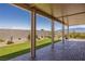 Covered patio with pavers and a view of the backyard at 1047 Atkins Ln, Mesquite, NV 89027