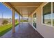 Extended covered patio with brick pavers and an expansive backyard view at 1047 Atkins Ln, Mesquite, NV 89027