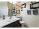 Well-lit bathroom featuring framed military certificates on the wall, adding a personal touch and character at 10579 Garden Rose Dr, Las Vegas, NV 89135