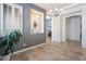 This dining area features neutral paint, tile floor and contemporary light fixture at 10579 Garden Rose Dr, Las Vegas, NV 89135